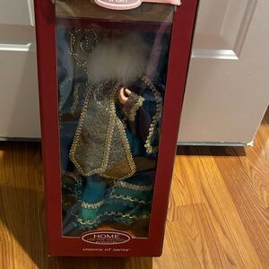 Elegant Santa Figurine with Gold and Blue Accents